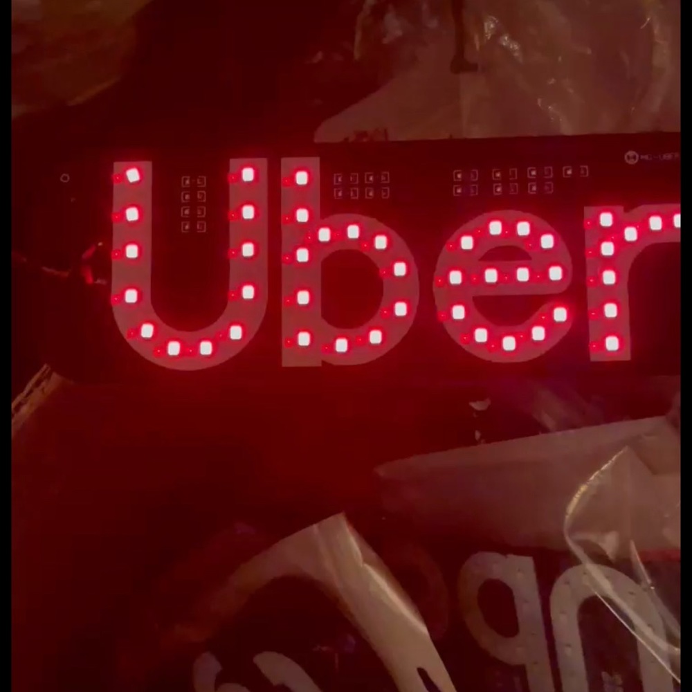 Red Light up car sign.